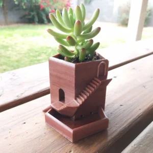 Tårn · urtepotte. Kildeudgiverens foto af modellen Tower Planter Pot; original farve. Foto: Qrome.